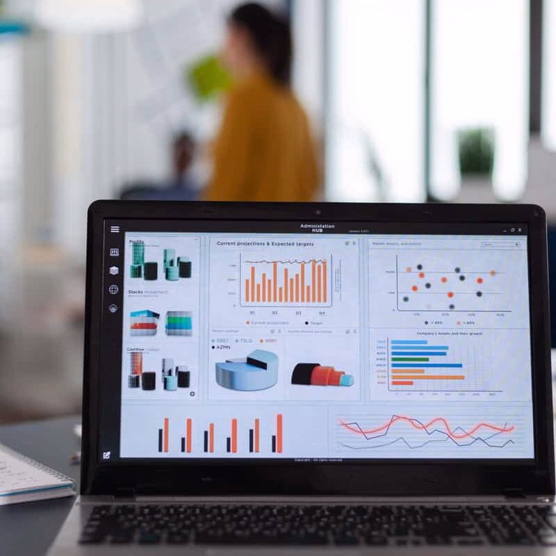 Laptop with marketing charts and data analytics